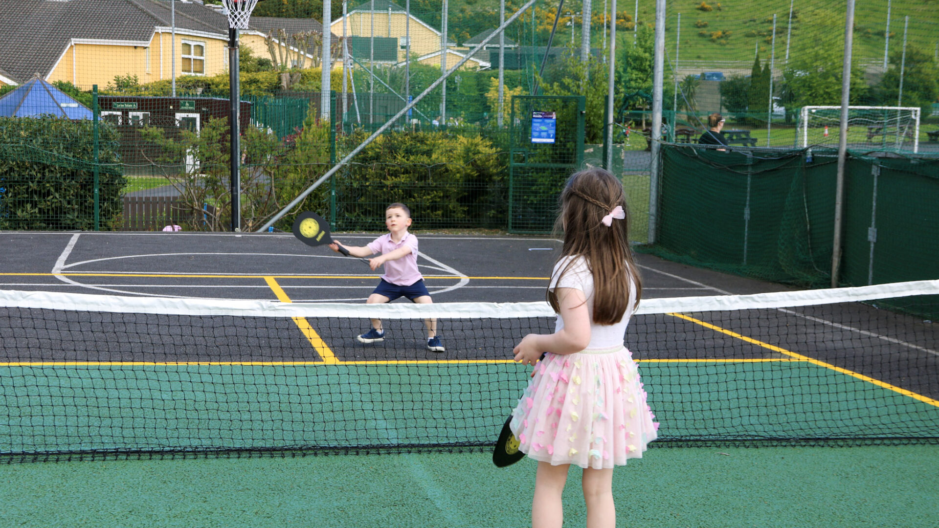 Playing tennis