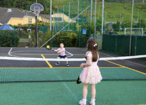 Playing tennis