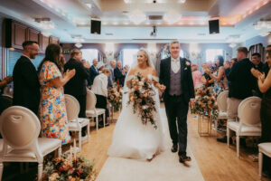 Walking down aisle